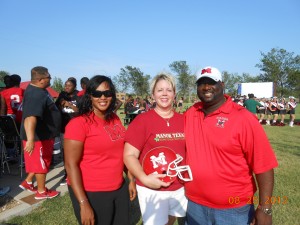 GLG owner Shana Whiteley with Manor Mustang Coach Sadd Jackson wife Mrs. Jackson